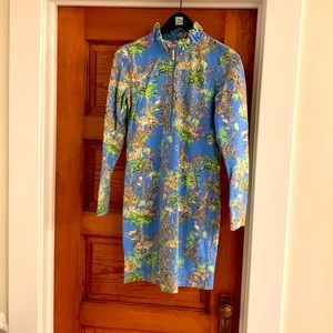 So small Lilly Pulitzer dress with ruffle neck and pockets.